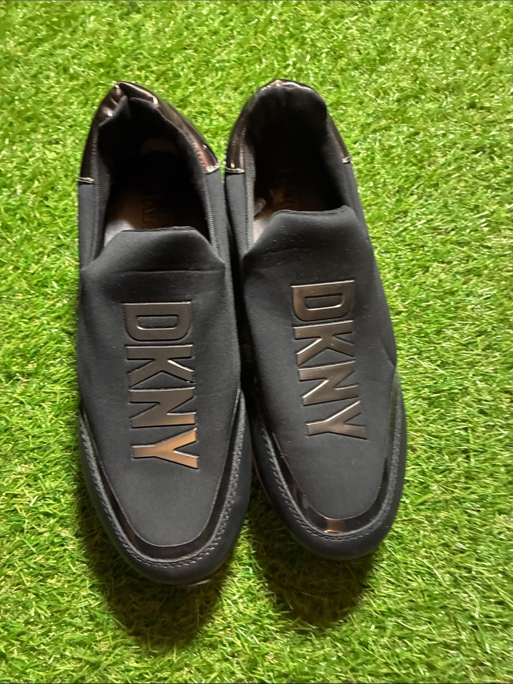 DKNY Black Slip-On Loafers with Metallic Logo